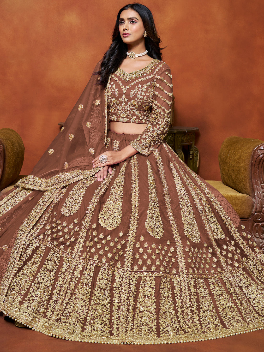 Gorgeous Brown Zari Embroidered Net Reception Wear Lehenga Choli