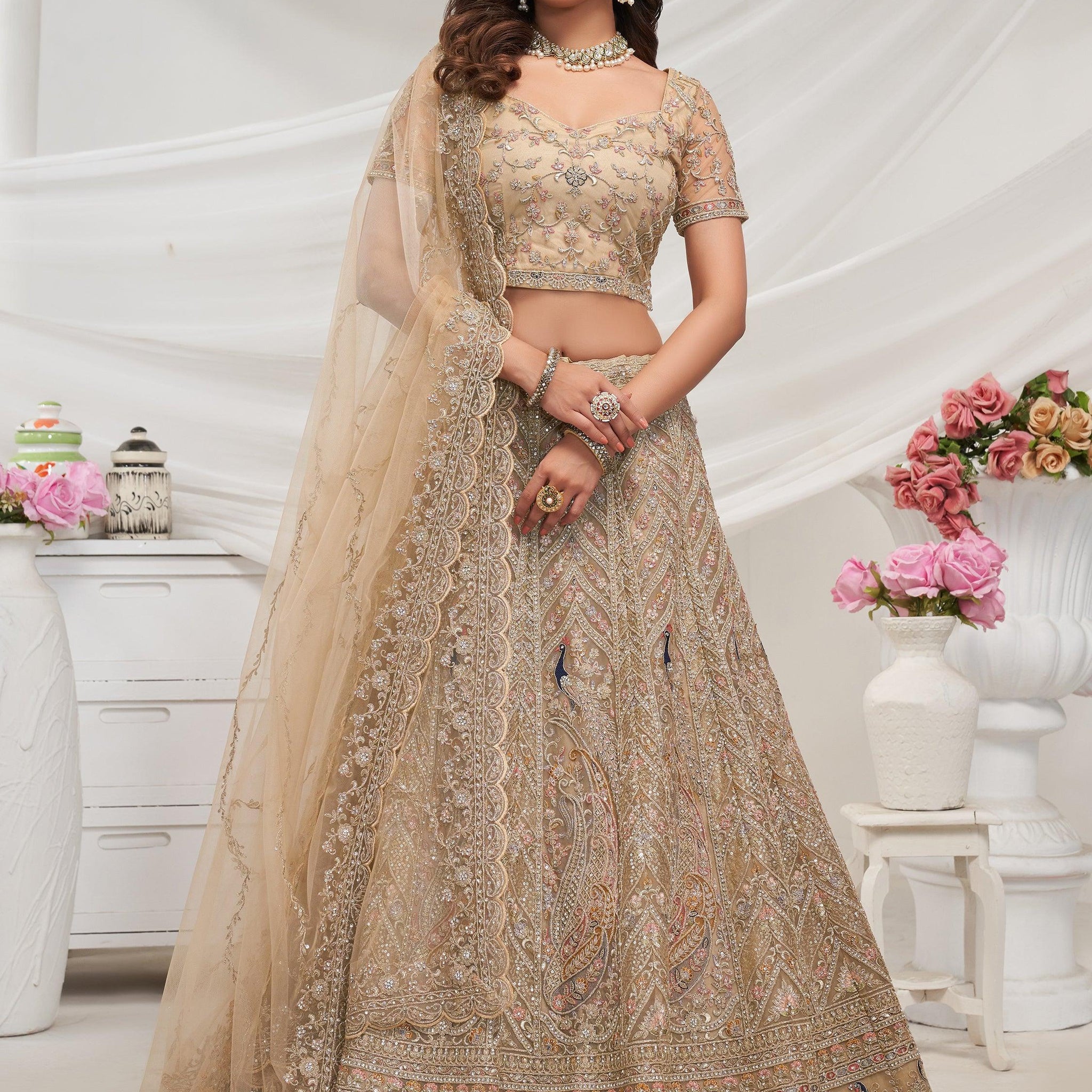 Tantalizing Golden Embroidered Net Bridesmaid Lehenga Choli