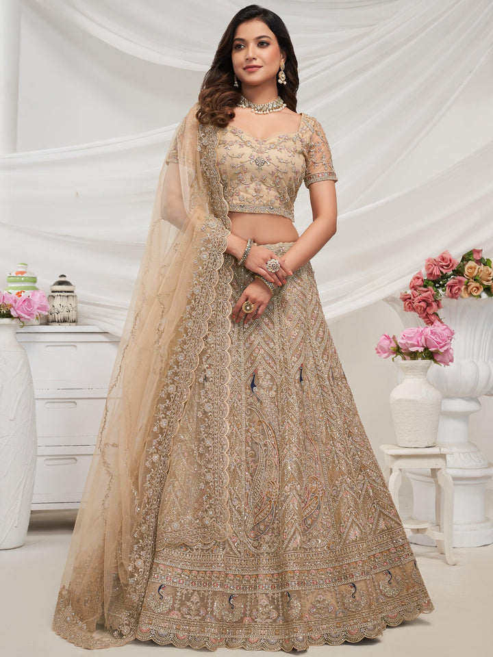 Tantalizing Golden Embroidered Net Bridesmaid Lehenga Choli