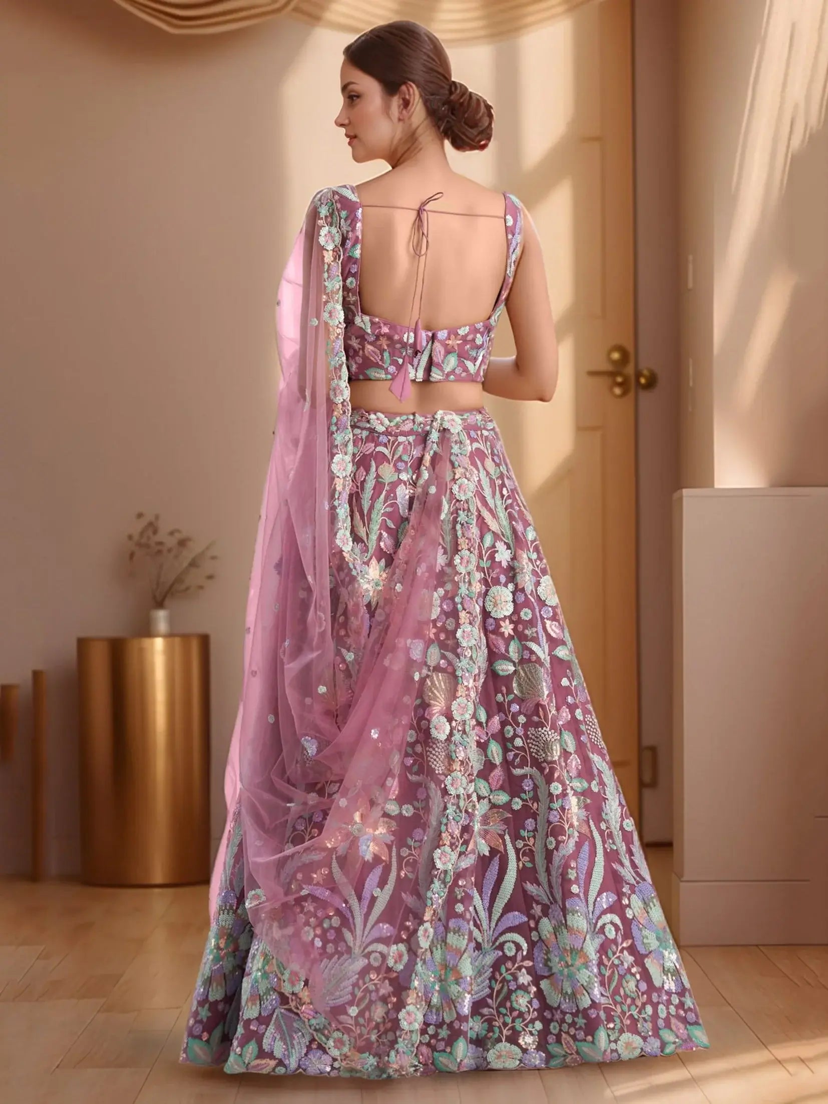 Astonishing Pink Sequins Embroidered Net Reception Wear Lehenga With Blouse