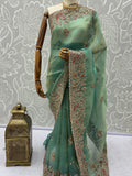 Elegant Pista Green Dori Embroidered Silk Engagement Wear Saree