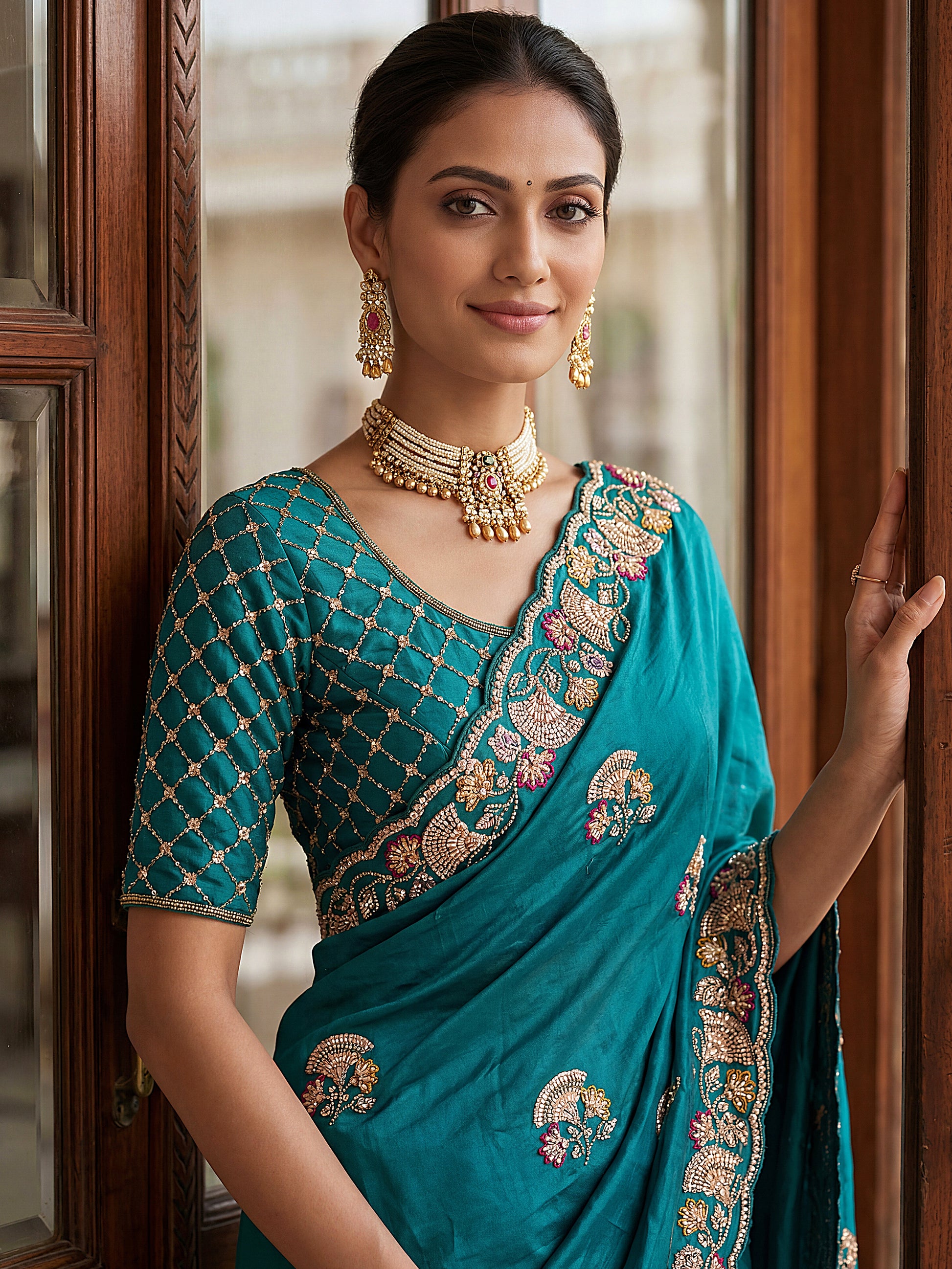 Marvelous Teal Green Embroidered Silk Reception Wear Saree