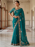Marvelous Teal Green Embroidered Silk Reception Wear Saree