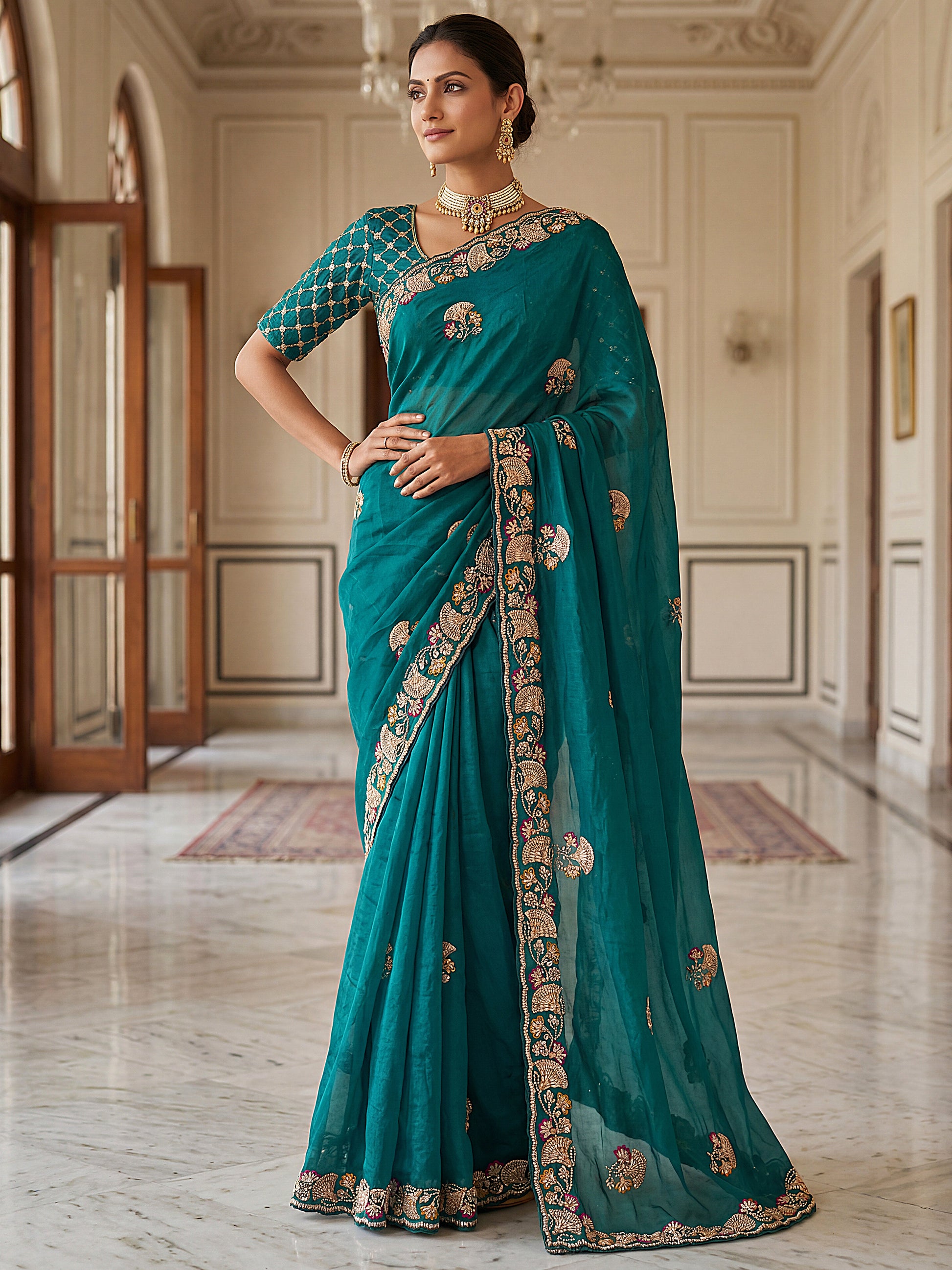 Marvelous Teal Green Embroidered Silk Reception Wear Saree