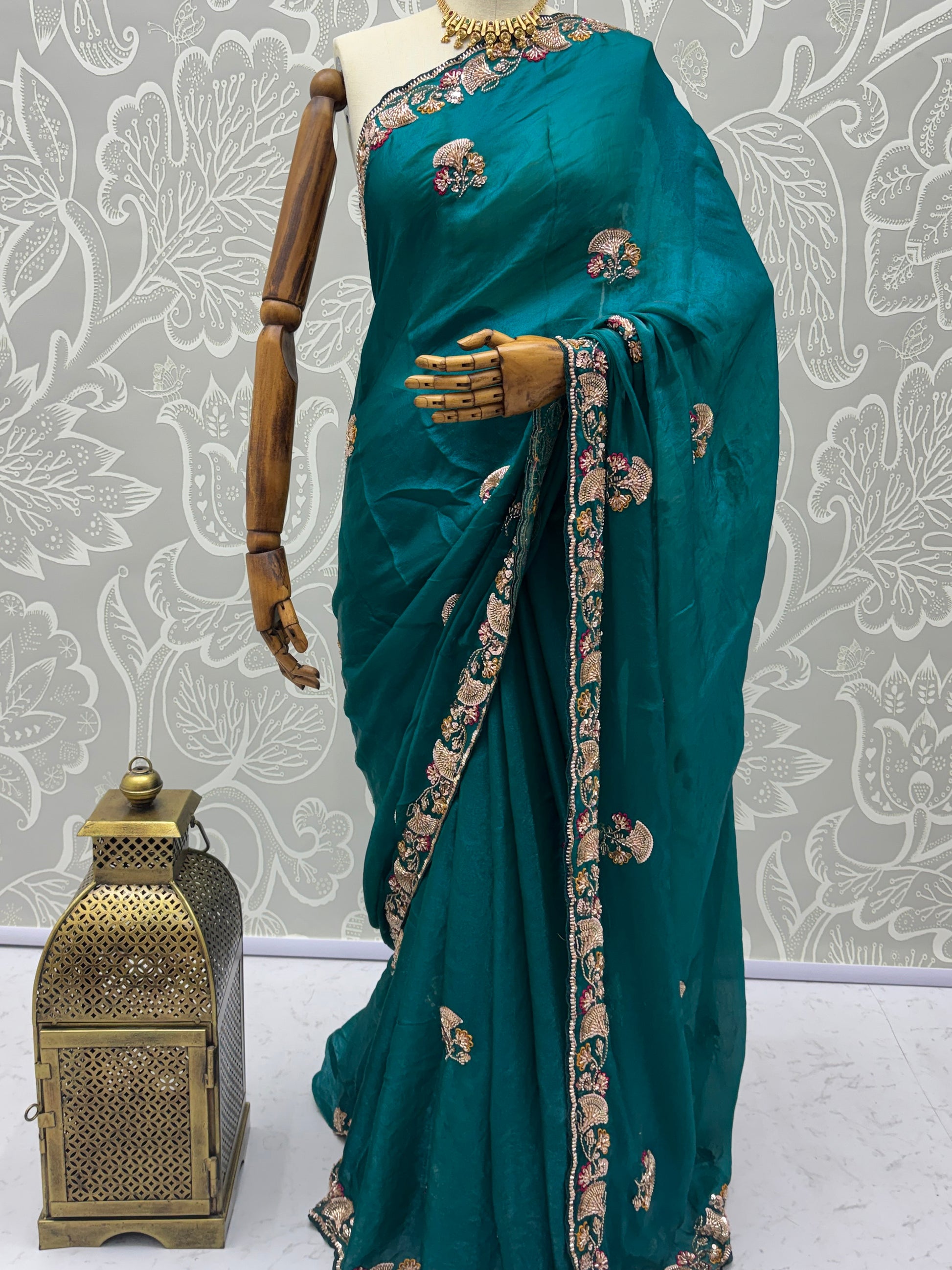 Marvelous Teal Green Embroidered Silk Reception Wear Saree