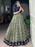 Impressive Navy Blue Printed Chanderi Festival Wear Gown With Koti