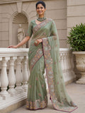 Gorgeous Pista Green Embroidered Organza Reception Wear Saree With Blouse