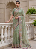 Gorgeous Pista Green Embroidered Organza Reception Wear Saree With Blouse