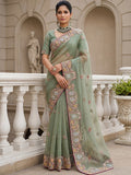 Gorgeous Pista Green Embroidered Organza Reception Wear Saree With Blouse