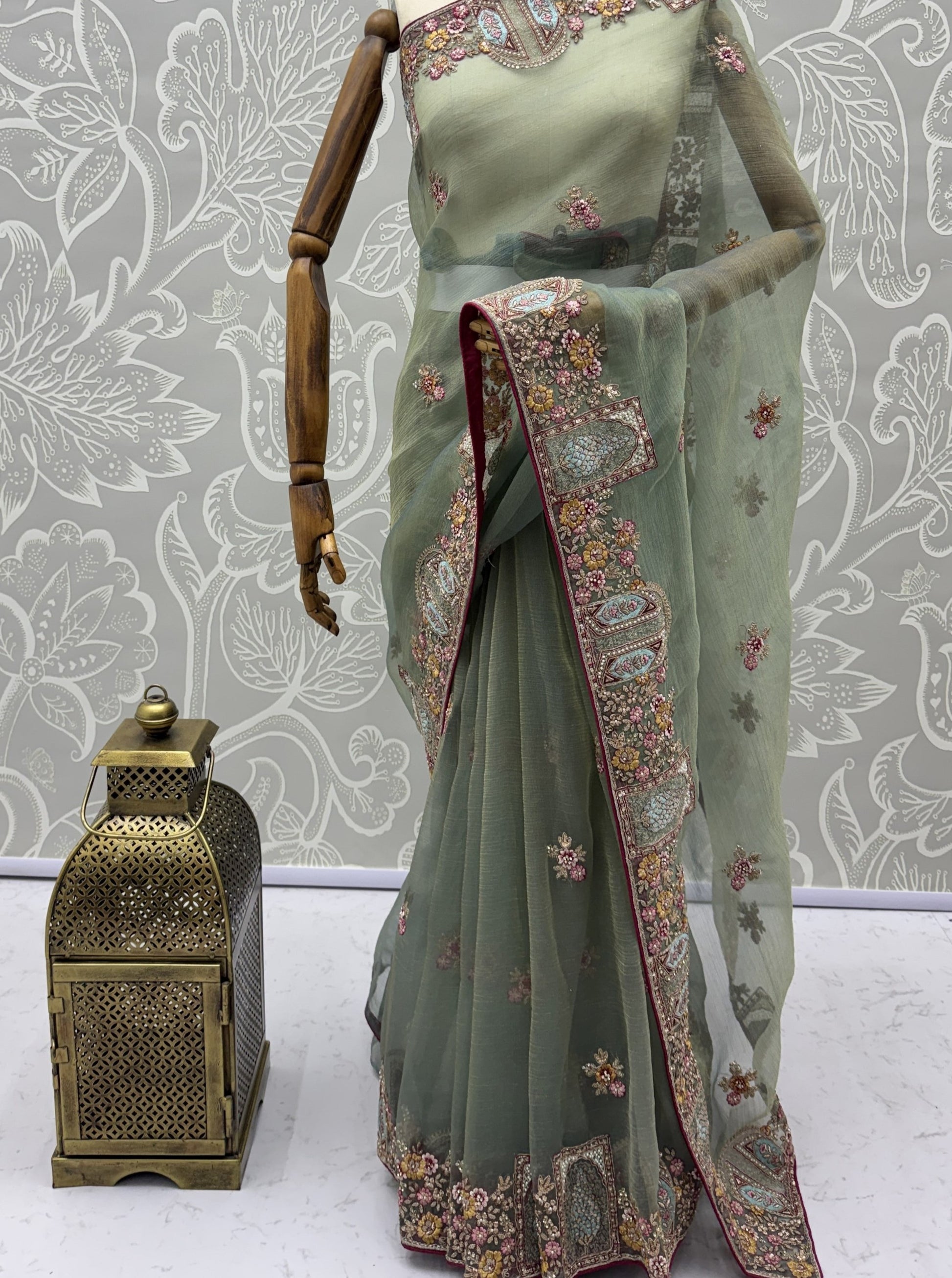 Gorgeous Pista Green Embroidered Organza Reception Wear Saree With Blouse