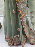 Gorgeous Pista Green Embroidered Organza Reception Wear Saree With Blouse
