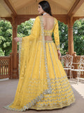 Alluring Yellow Foil Work Net Haldi Wear Lehenga Choli With Dupatta