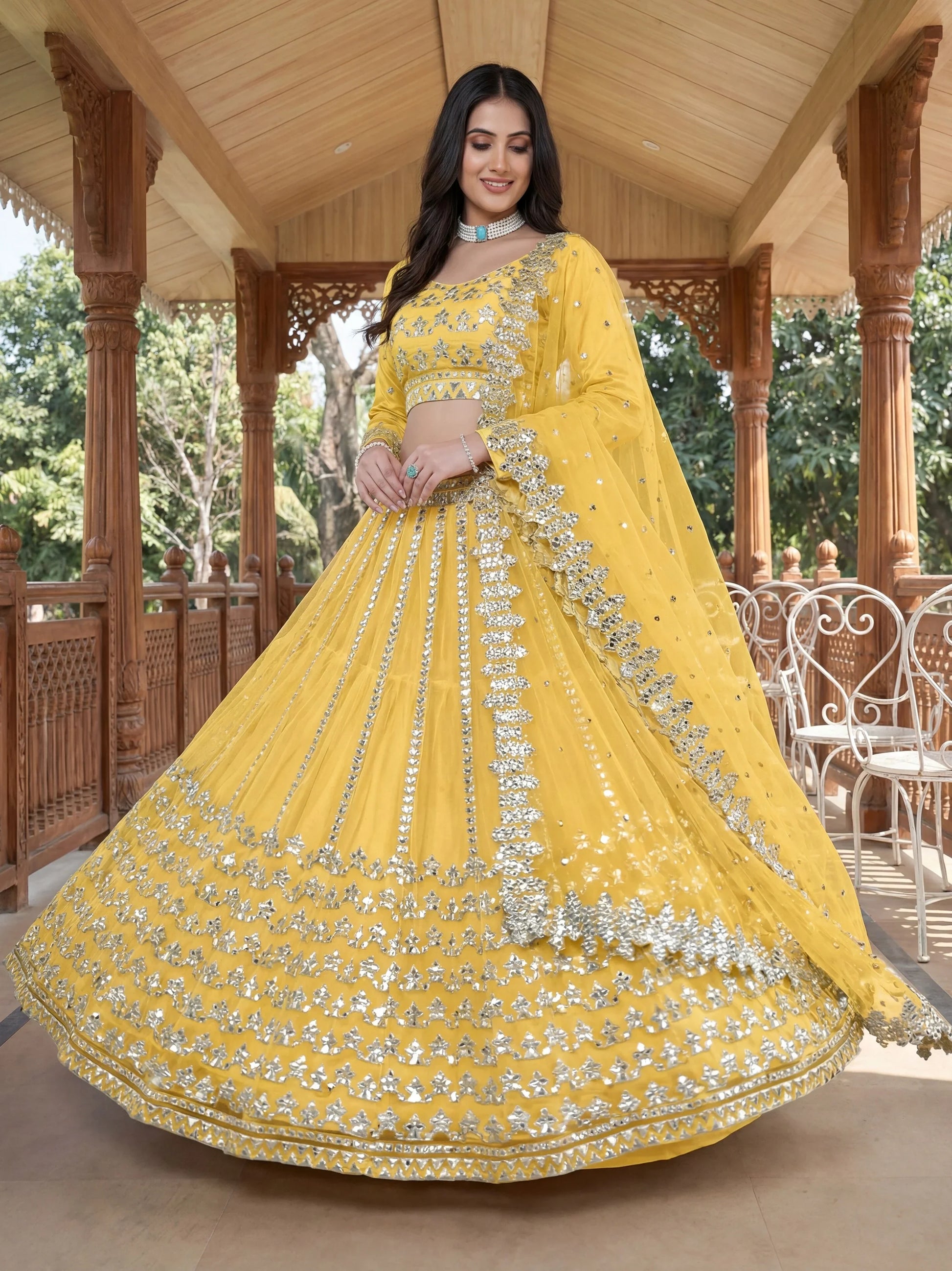 Alluring Yellow Foil Work Net Haldi Wear Lehenga Choli With Dupatta