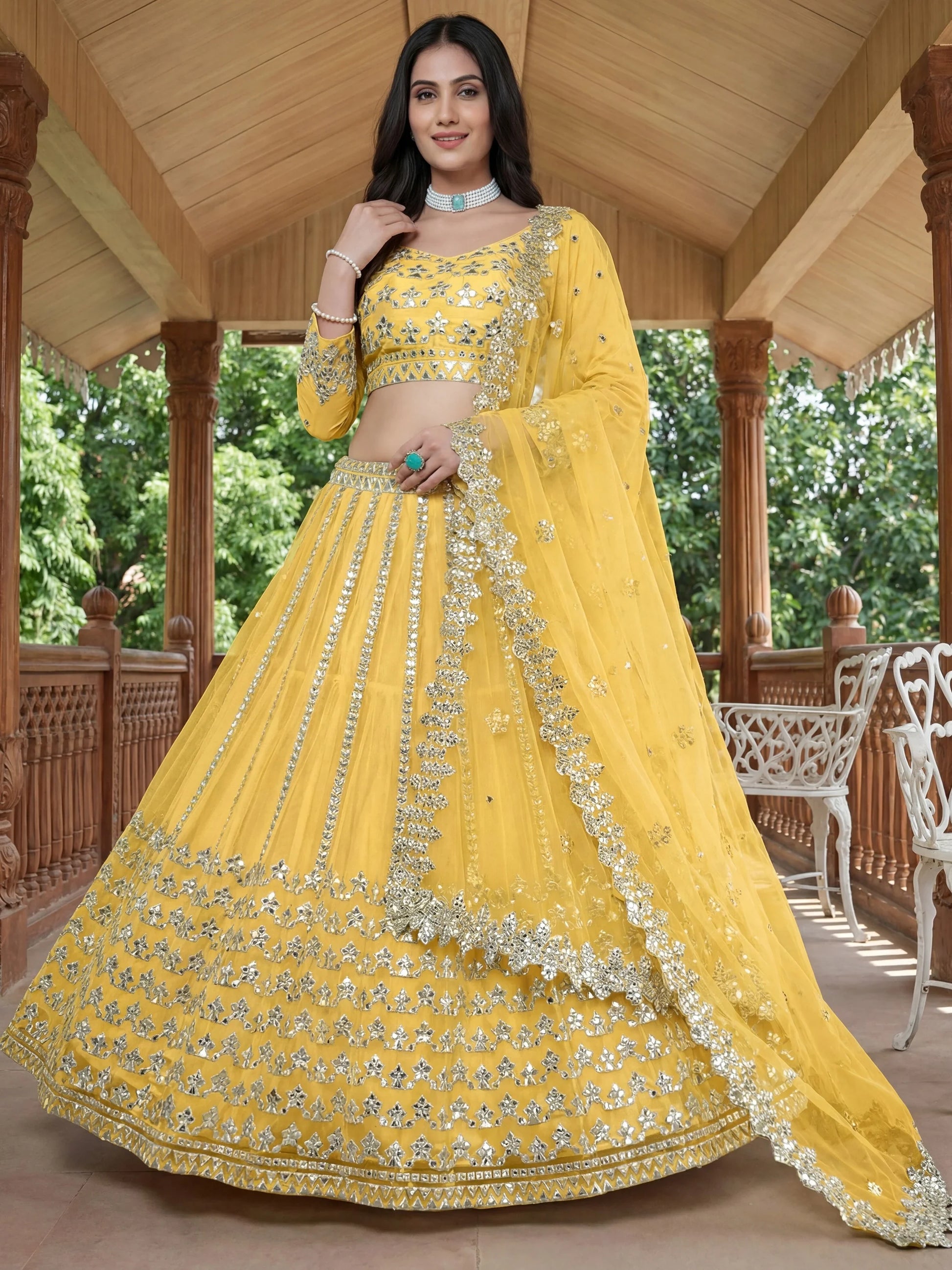 Alluring Yellow Foil Work Net Haldi Wear Lehenga Choli With Dupatta