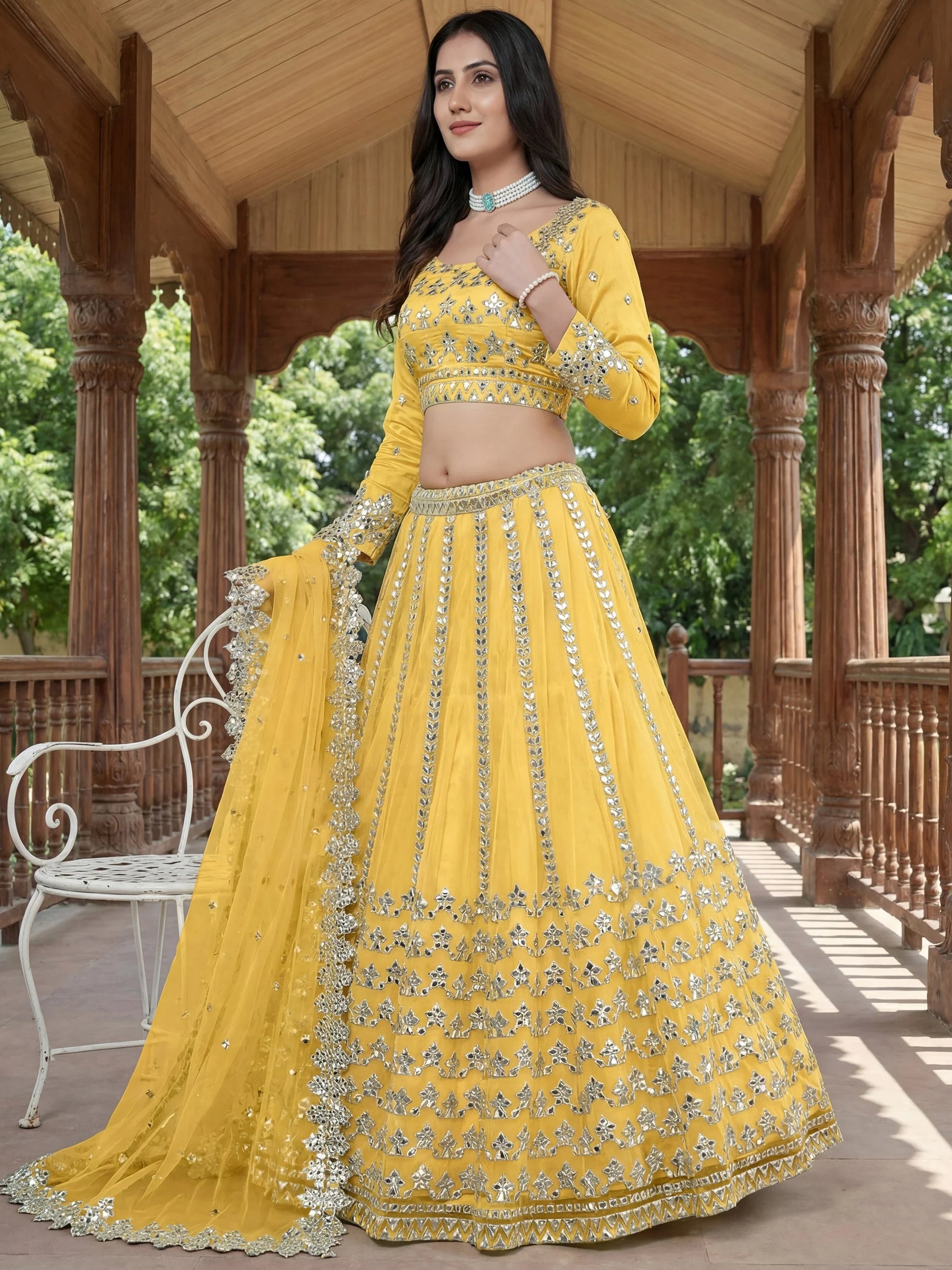 Alluring Yellow Foil Work Net Haldi Wear Lehenga Choli With Dupatta