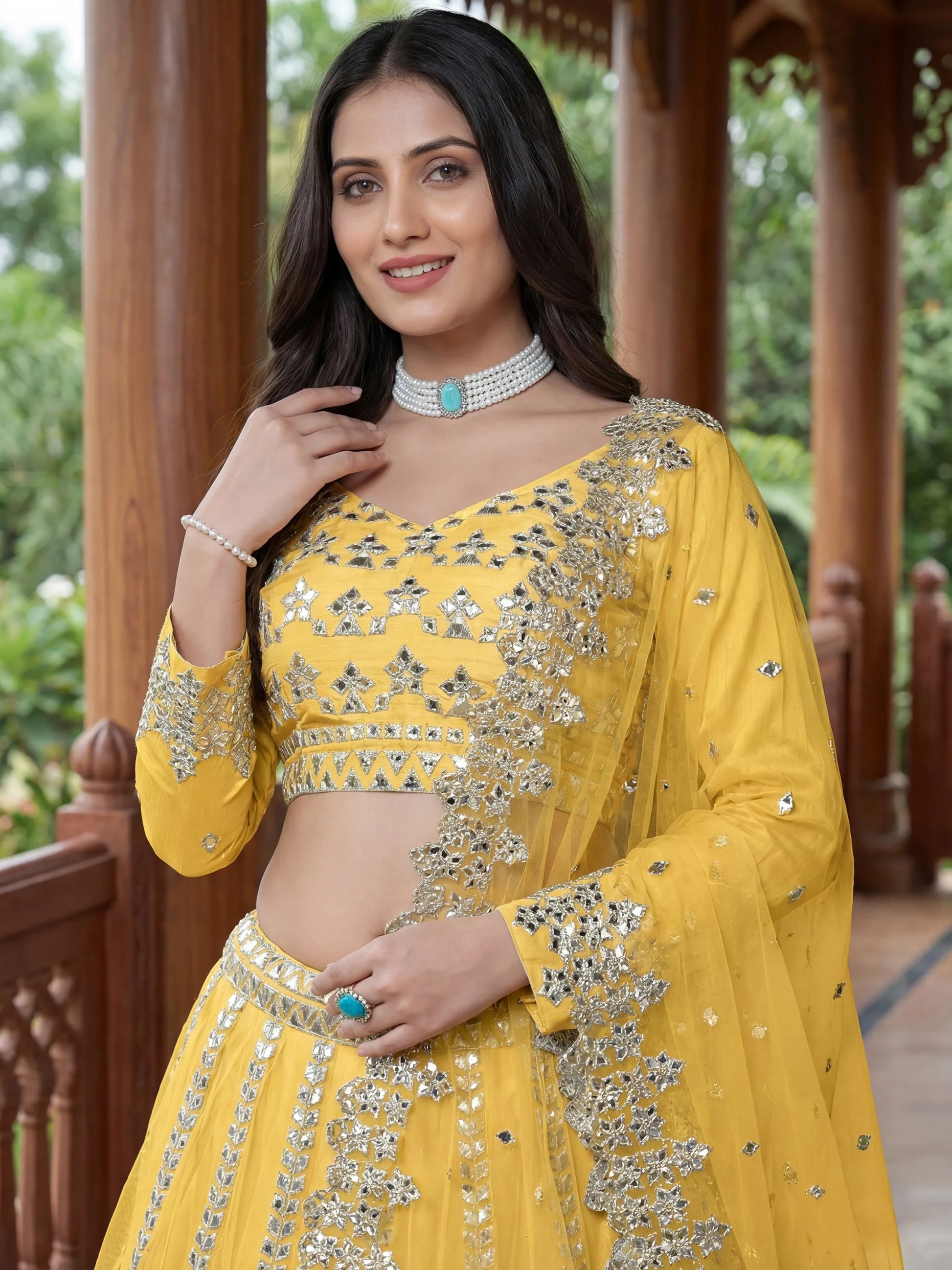 Alluring Yellow Foil Work Net Haldi Wear Lehenga Choli With Dupatta
