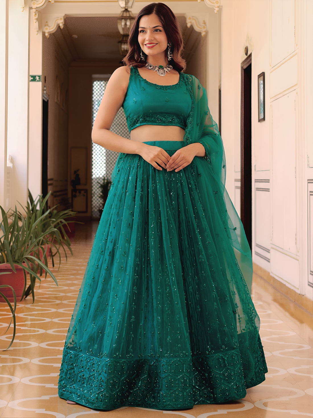 Delightful Teal Green Thread Embroidery Net Party Wear Lehenga Choli