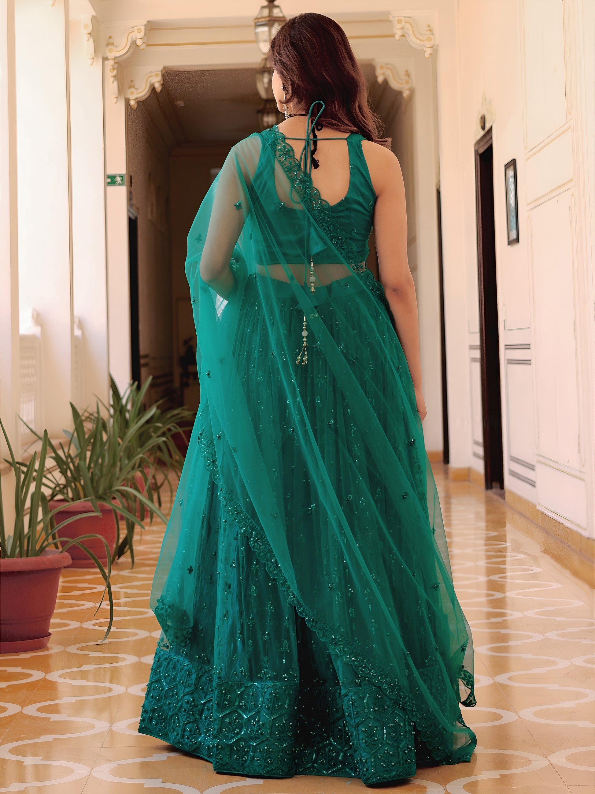 Delightful Teal Green Thread Embroidery Net Party Wear Lehenga Choli