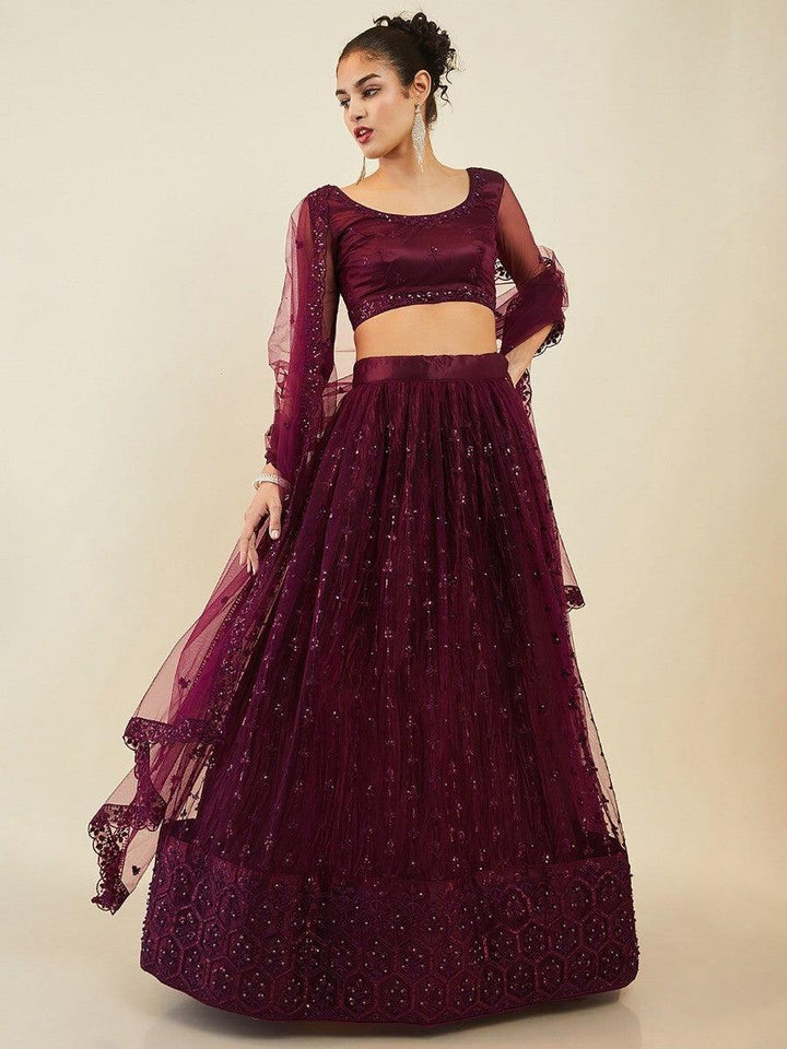 Stunning Wine Embroidered Net Wedding Wear Lehenga Choli With Dupatta