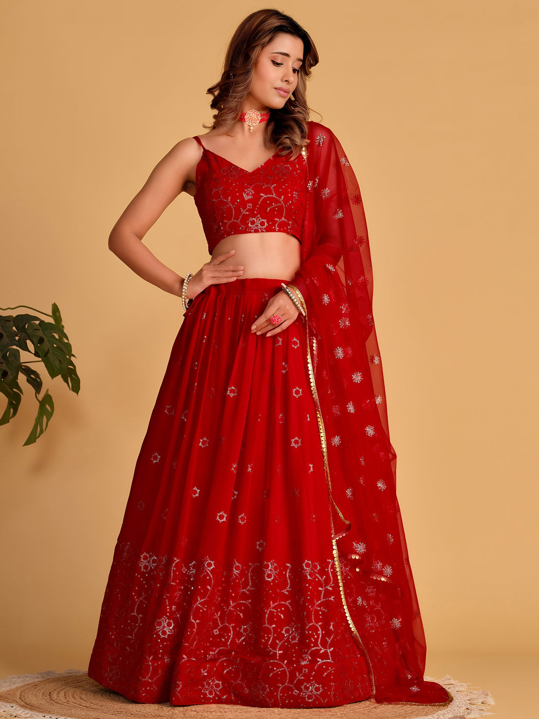 Spectacular Red Sequins Georgette Reception Wear Lehenga Choli