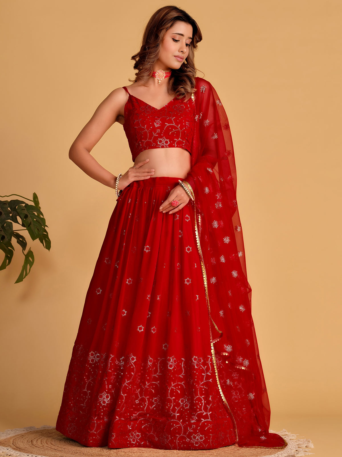 Spectacular Red Sequins Georgette Reception Wear Lehenga Choli