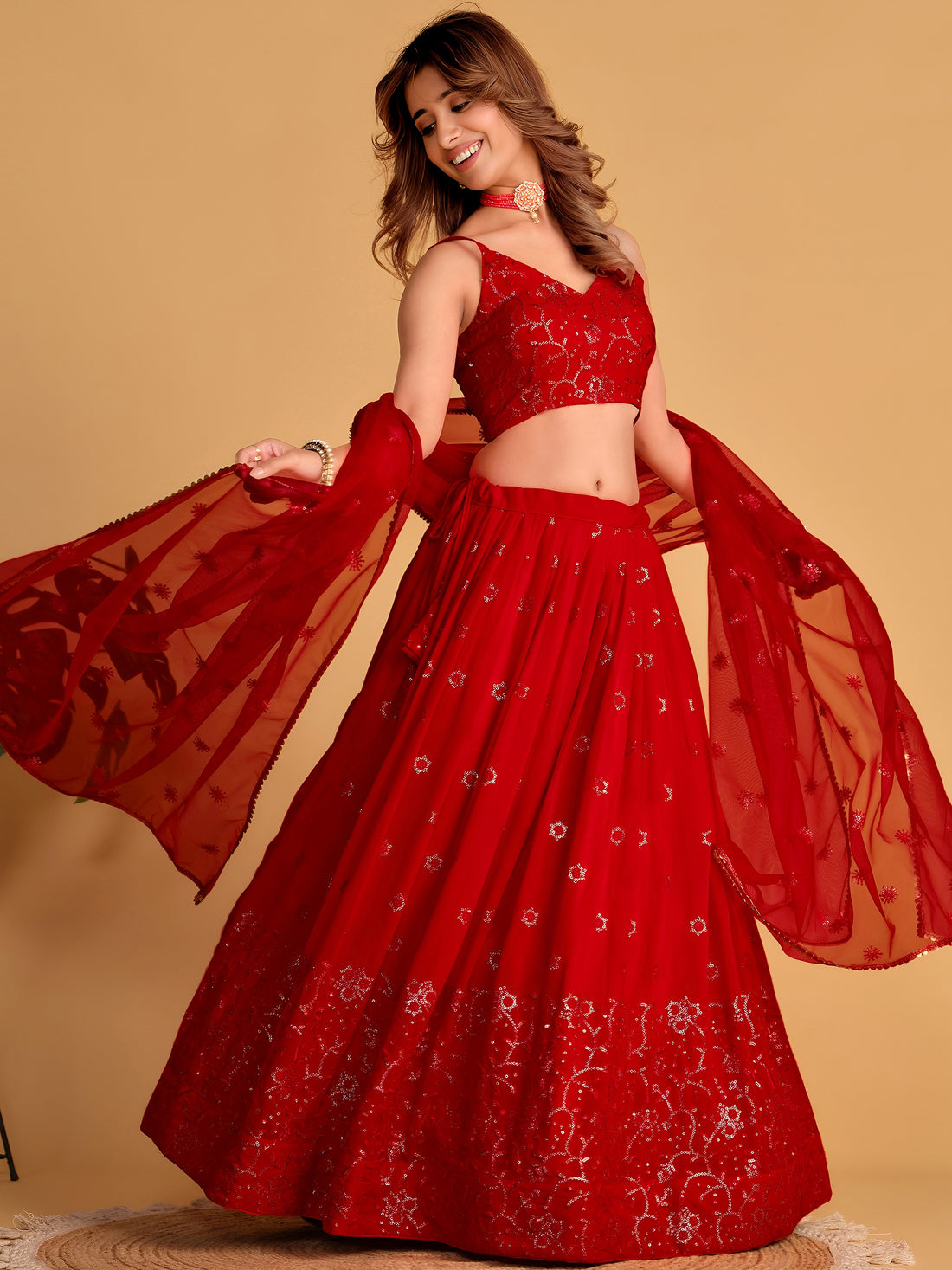 Spectacular Red Sequins Georgette Reception Wear Lehenga Choli