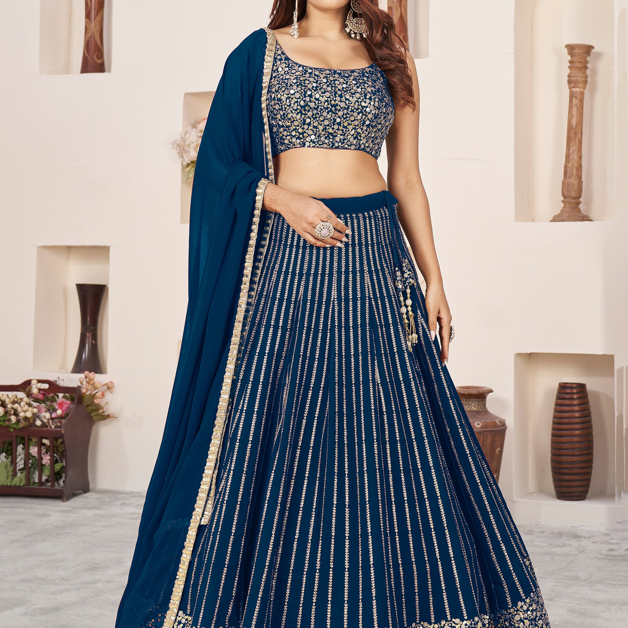 Awesome Blue Sequins Georgette Reception Wear Lehenga Choli