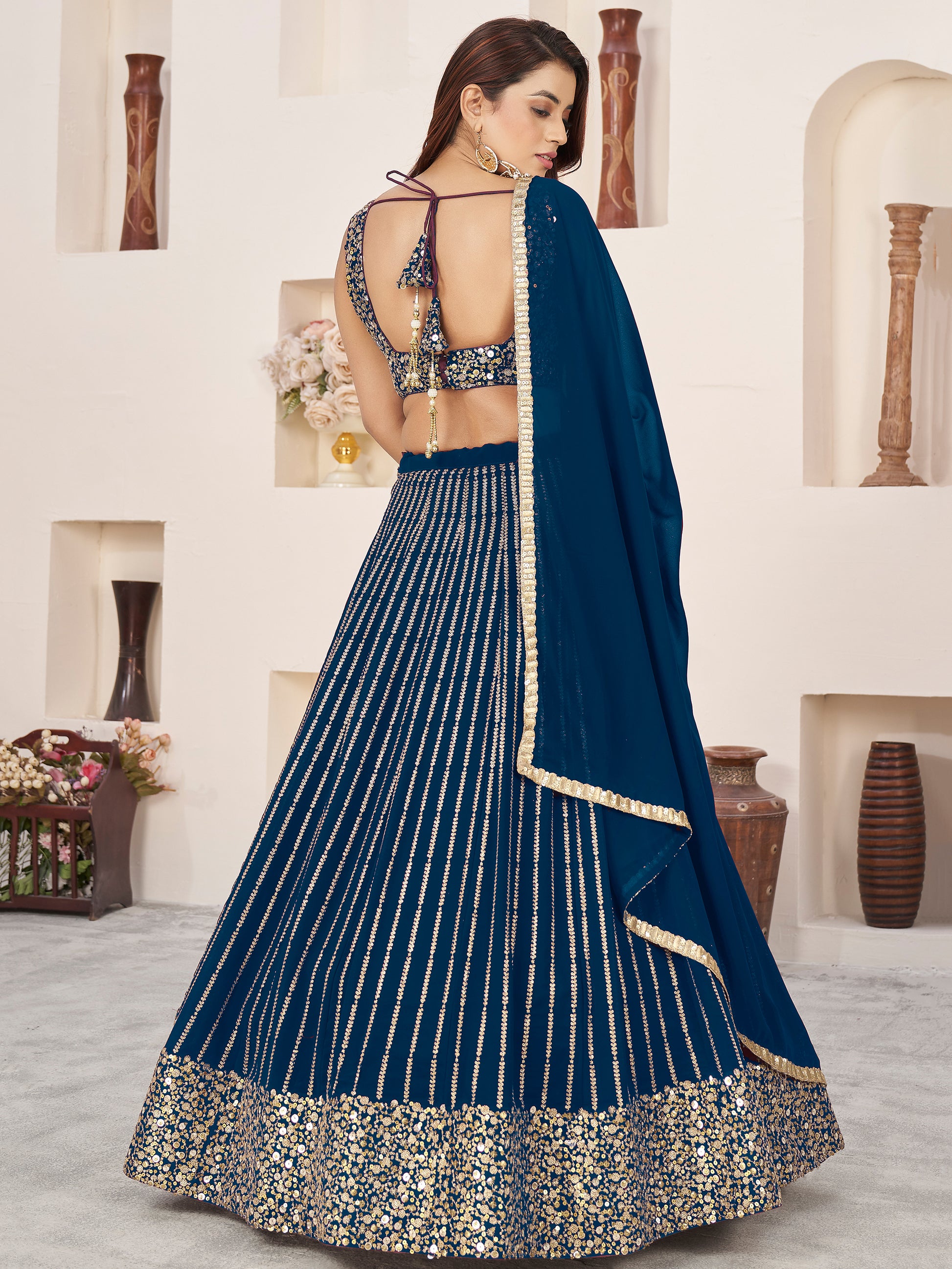 Awesome Blue Sequins Georgette Reception Wear Lehenga Choli