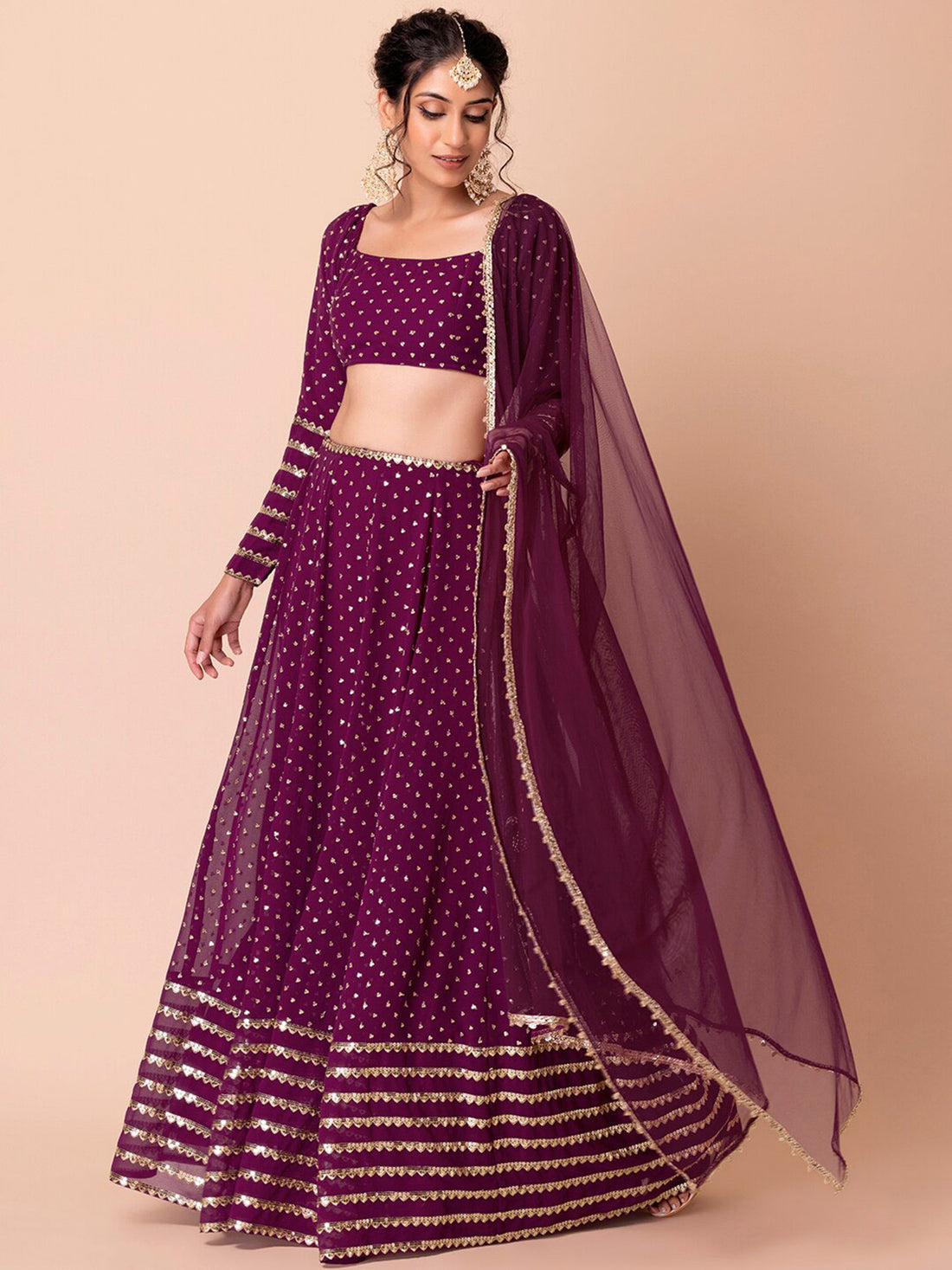 Fascinating Purple Sequins Georgette Wedding Wear Lehenga Choli