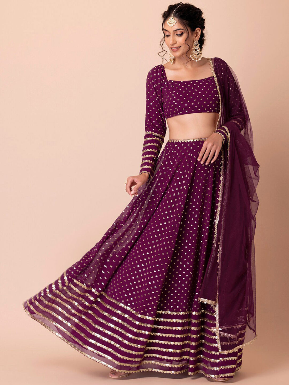 Fascinating Purple Sequins Georgette Wedding Wear Lehenga Choli