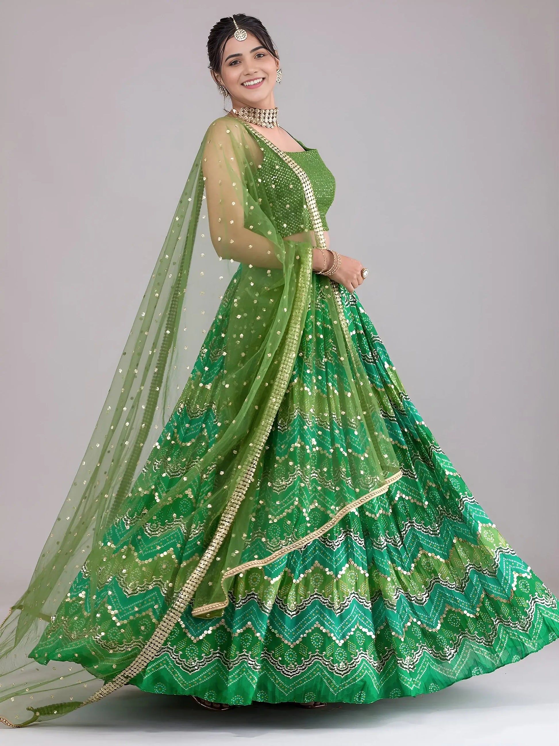Spectacular Green Sequins Work Georgette Mehendi Wear Lehenga Choli
