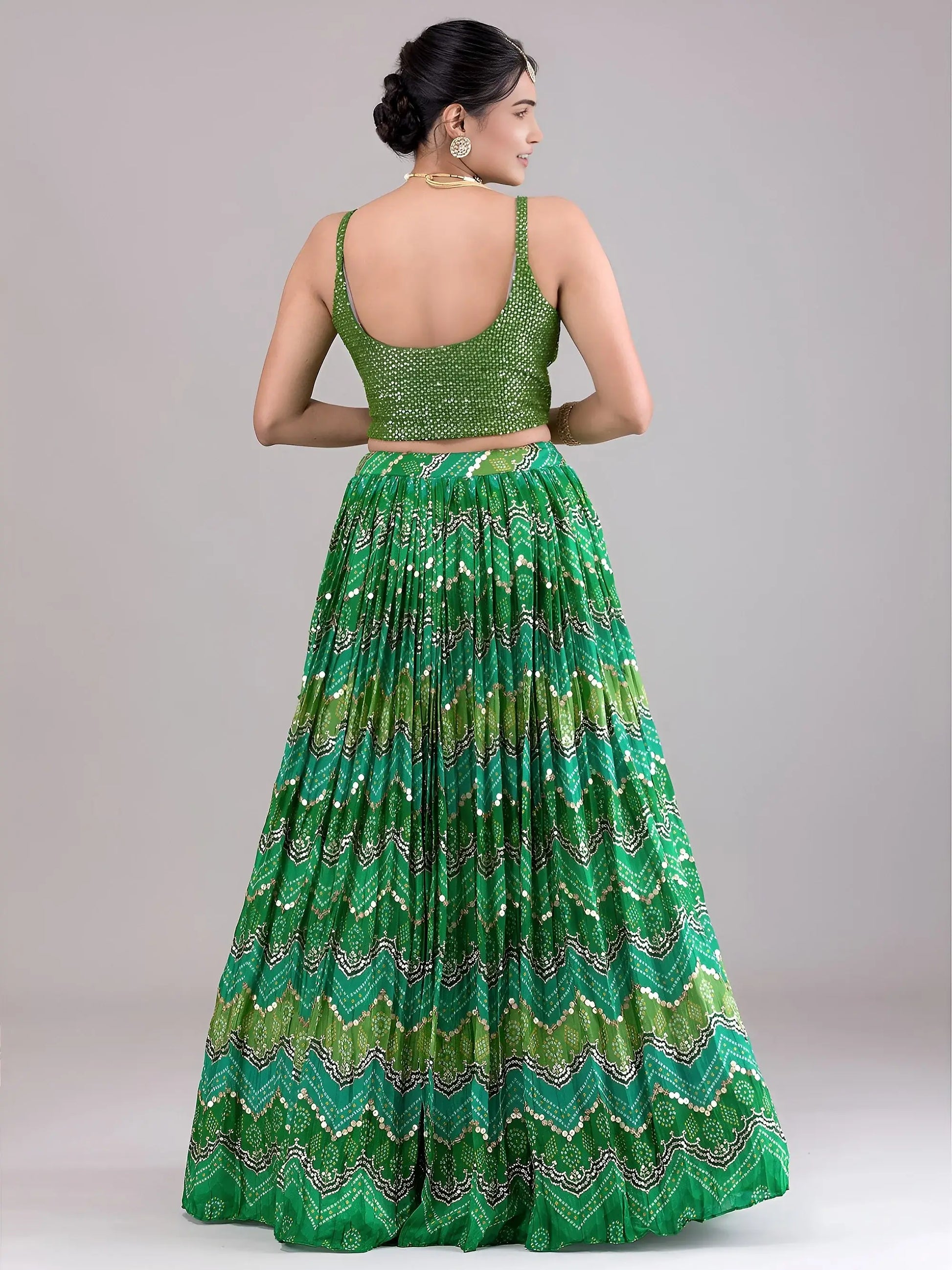 Spectacular Green Sequins Work Georgette Mehendi Wear Lehenga Choli