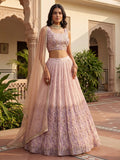 Sparkling Peach Georgette Sangeet Wear Lehenga With Mirror Work Blouse