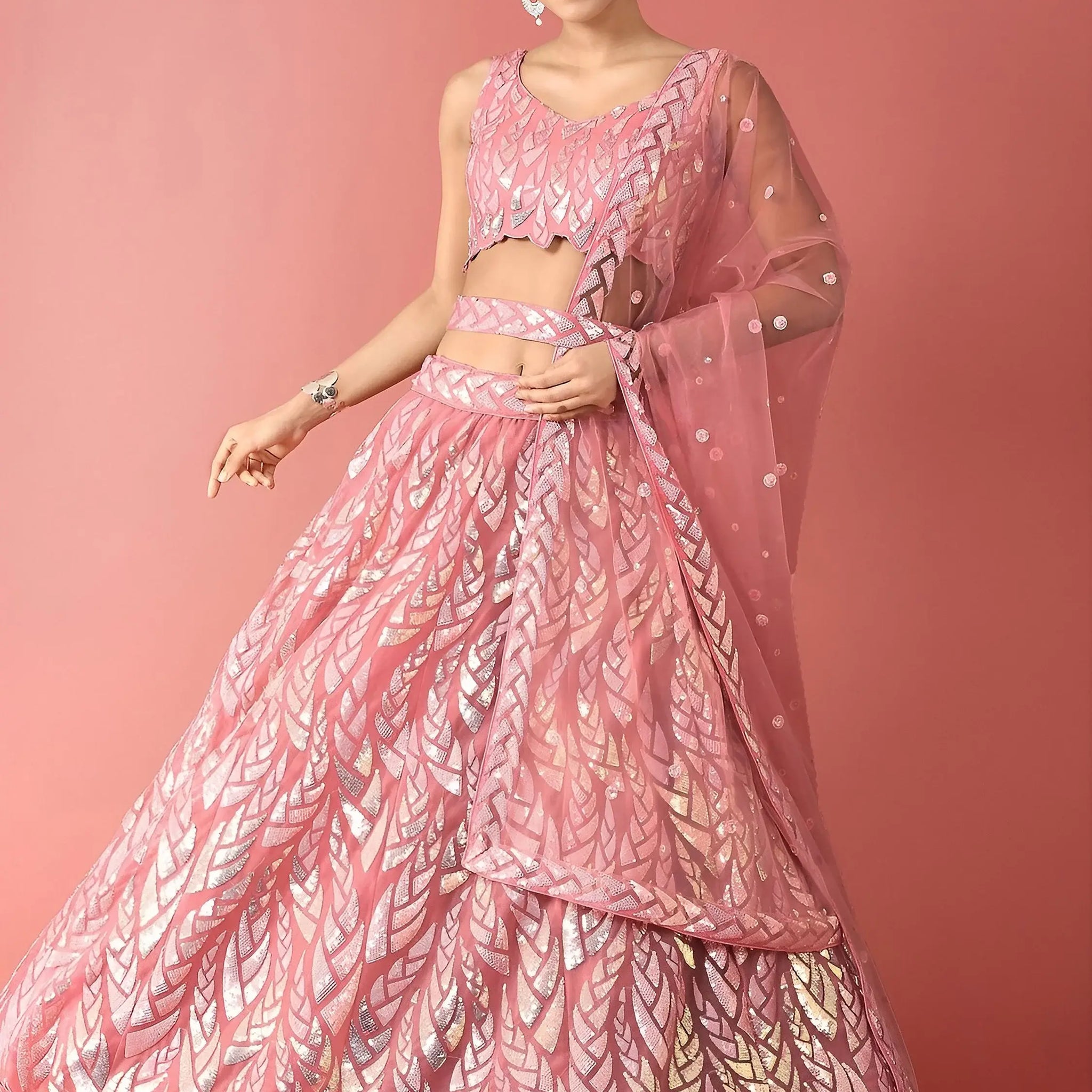 Outstanding Pink Sequins Net Reception Wear Lehenga Choli