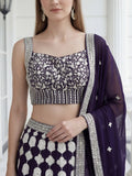 Pleasant Purple Sequin Georgette Wedding Wear Lehenga With Blouse