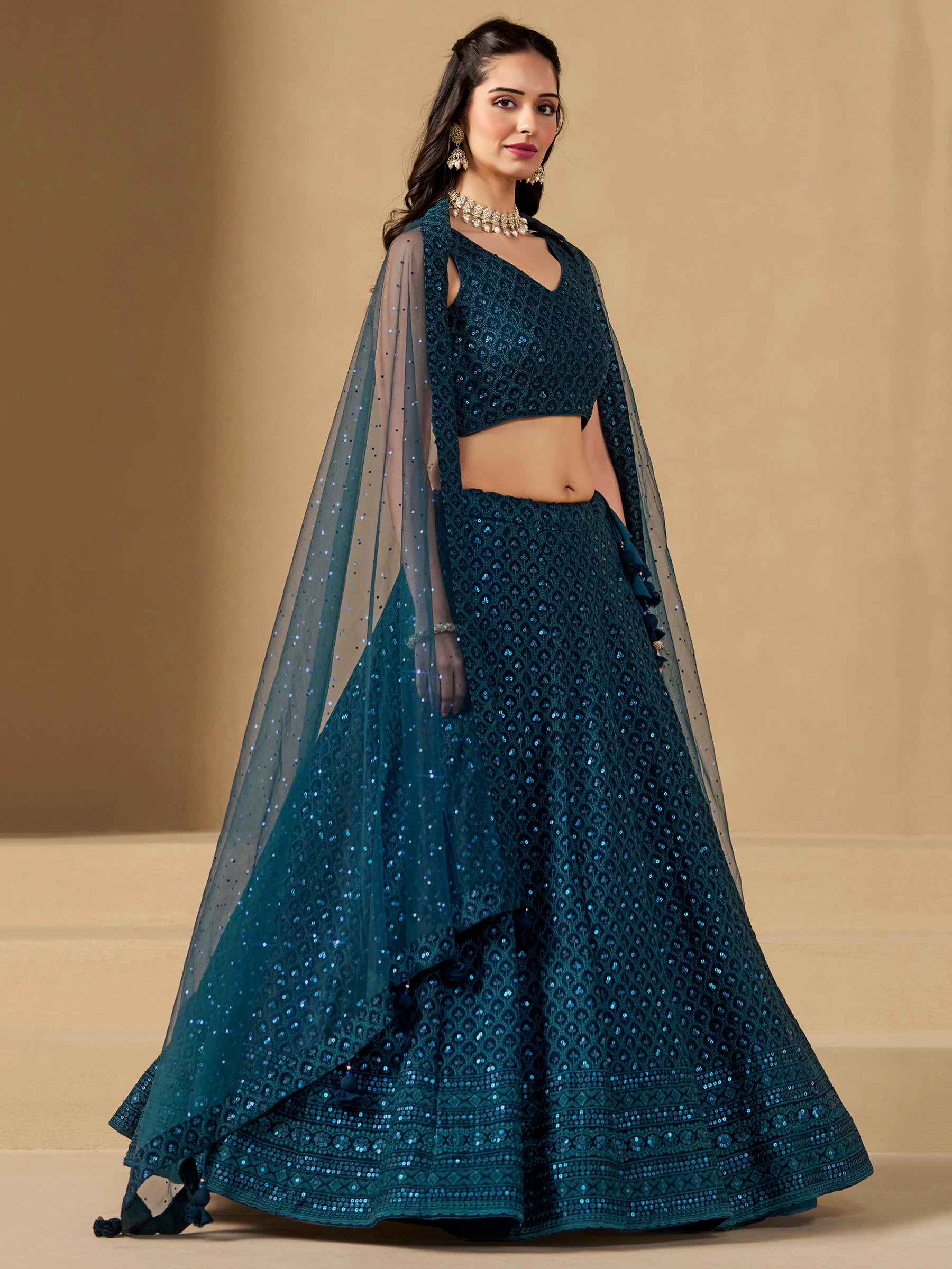 Fabulous Teal Blue Thread Embroidered Georgette Lehenga Choli