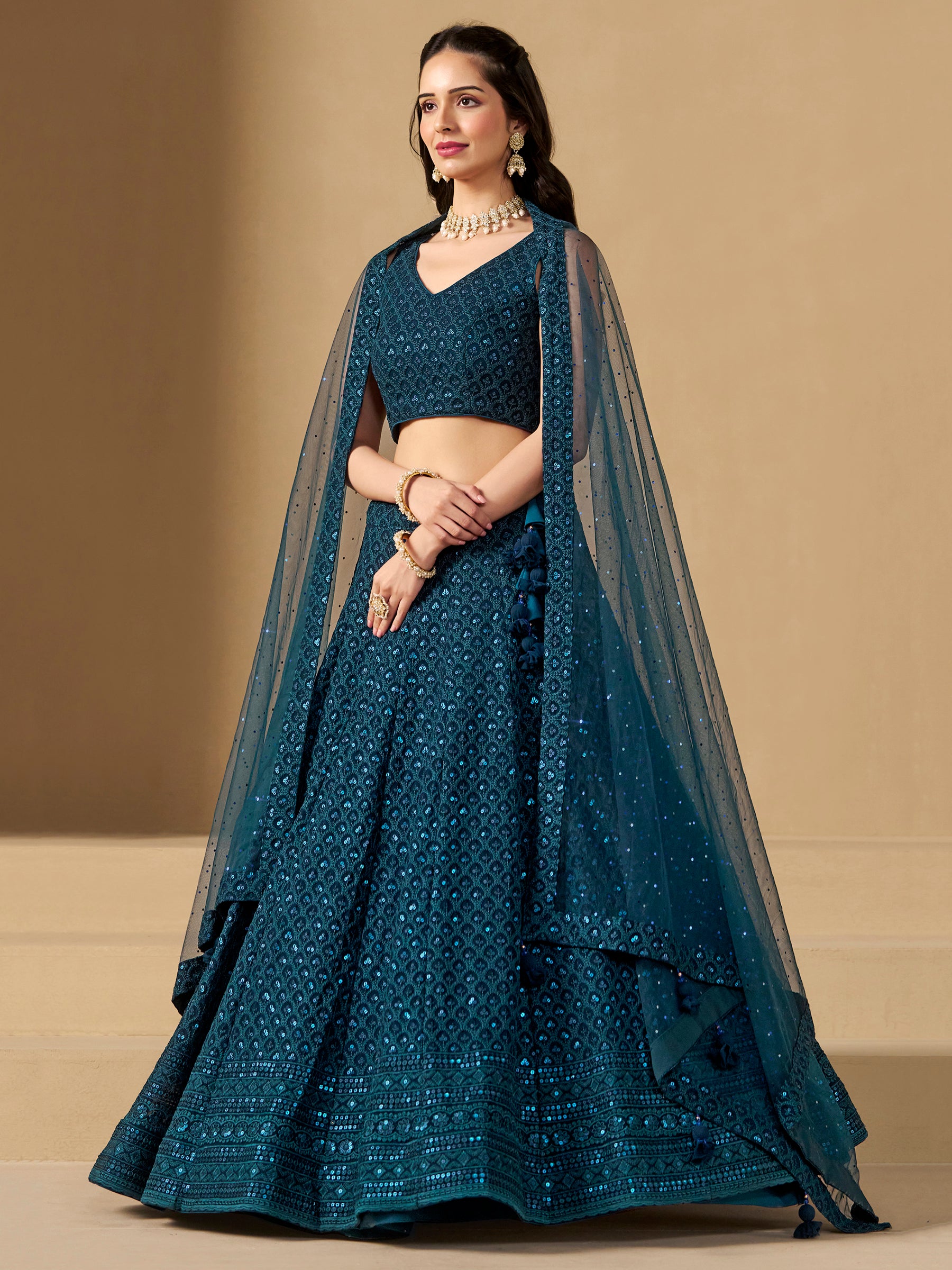 Fabulous Teal Blue Thread Embroidered Georgette Lehenga Choli