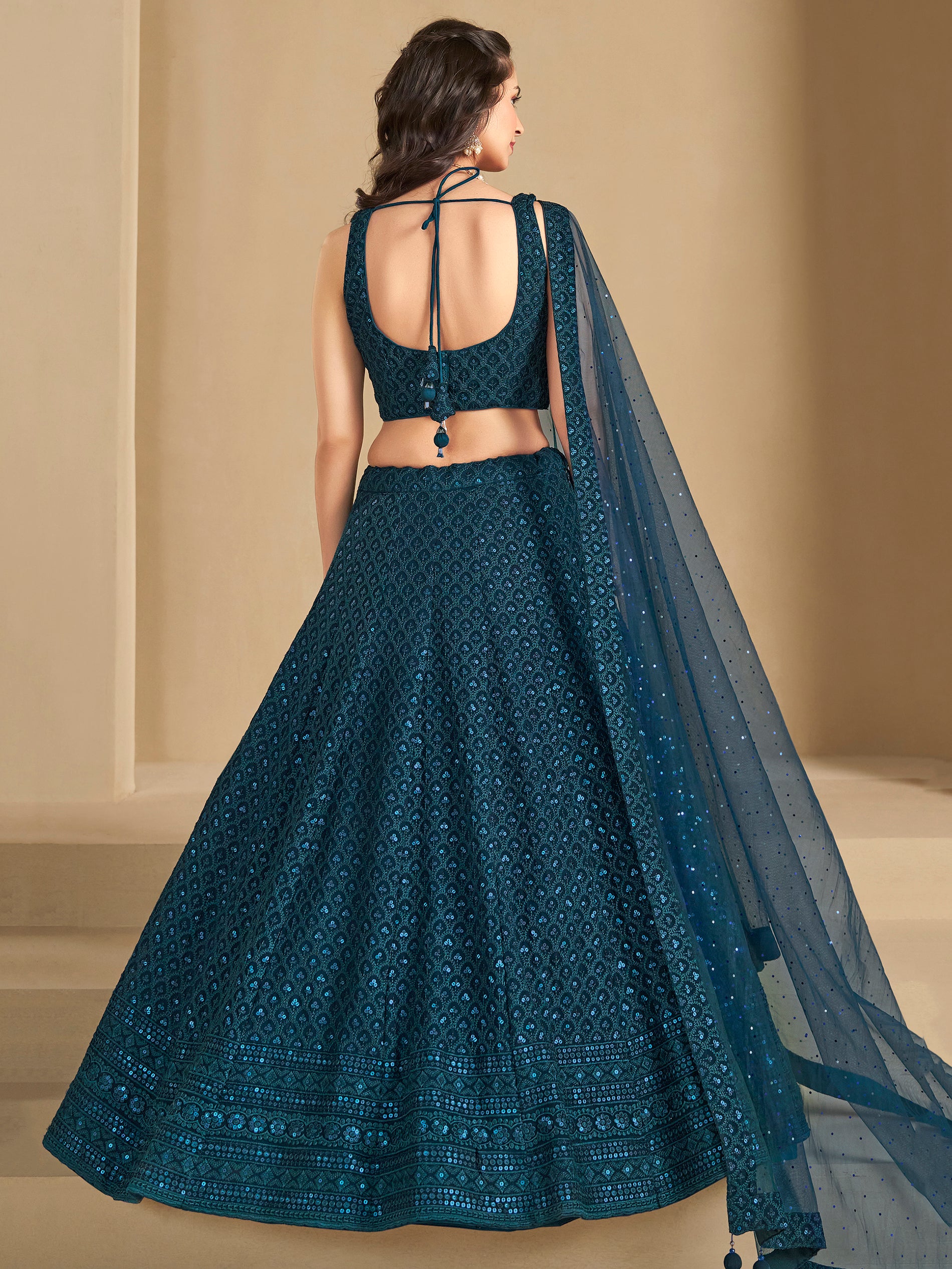 Fabulous Teal Blue Thread Embroidered Georgette Lehenga Choli