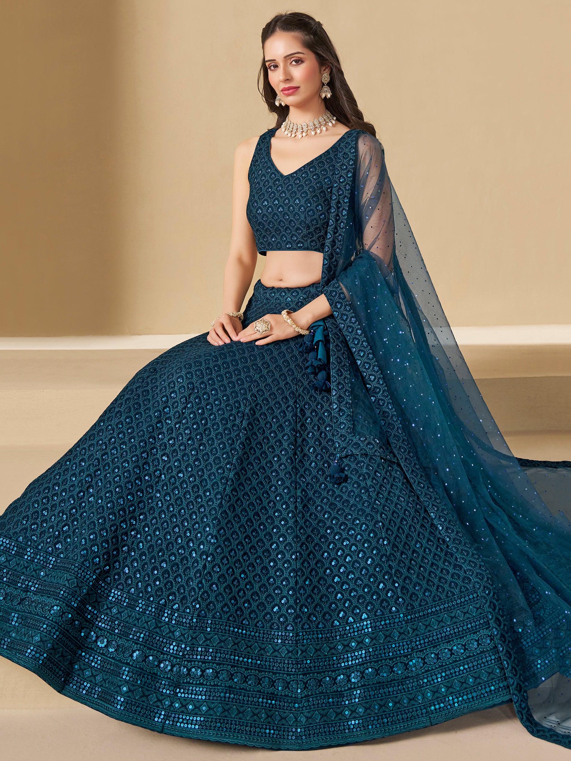 Fabulous Teal Blue Thread Embroidered Georgette Lehenga Choli