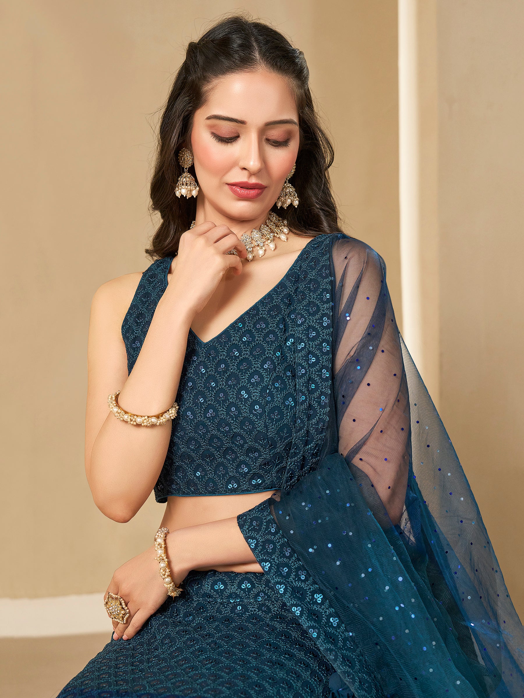 Fabulous Teal Blue Thread Embroidered Georgette Lehenga Choli