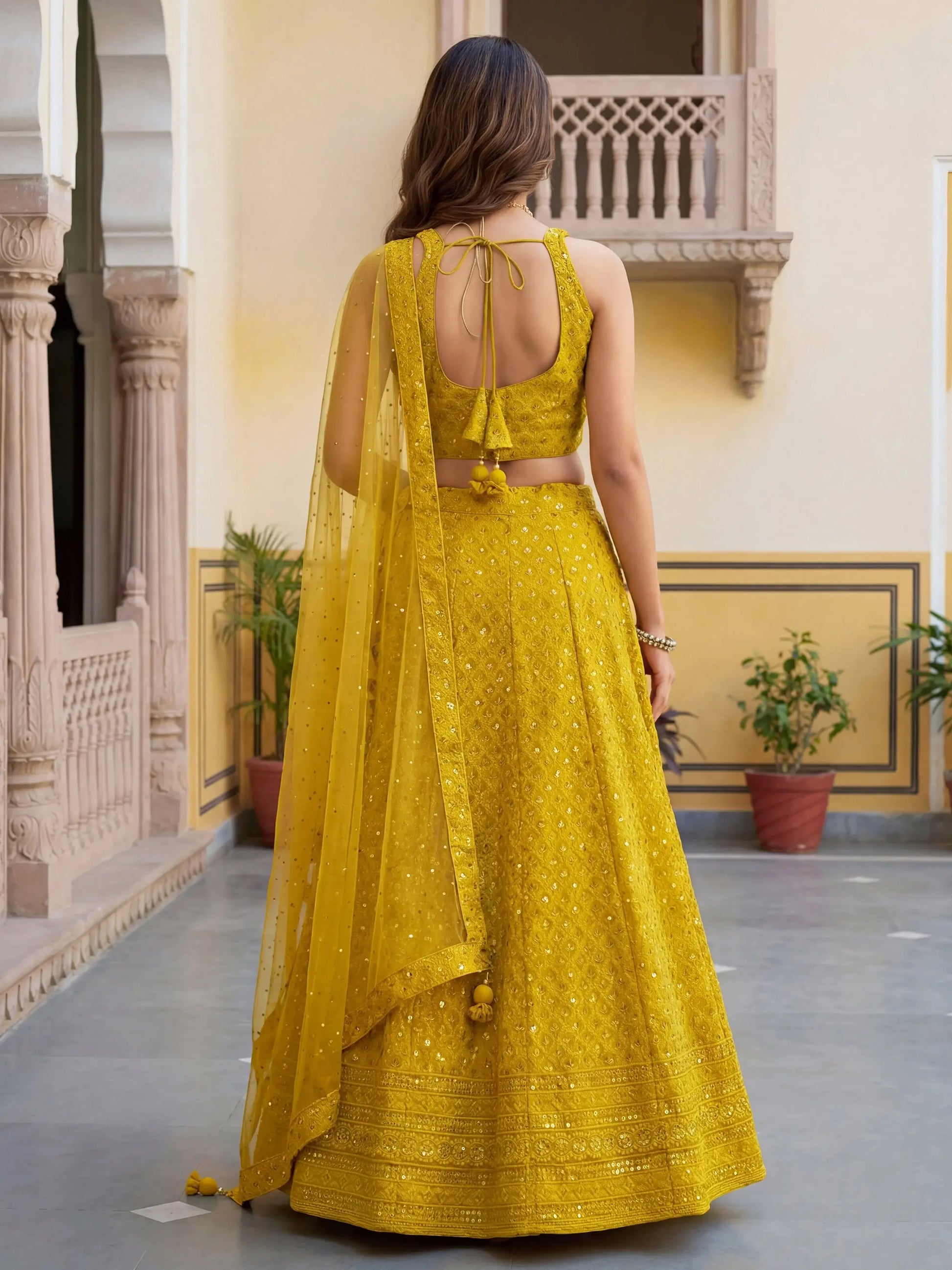 Magnificent Yellow Thread Work Georgette Haldi Wear Lehenga Choli