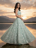 Alluring Mint Green Sequins Net Reception Wear Lehenga With Blouse