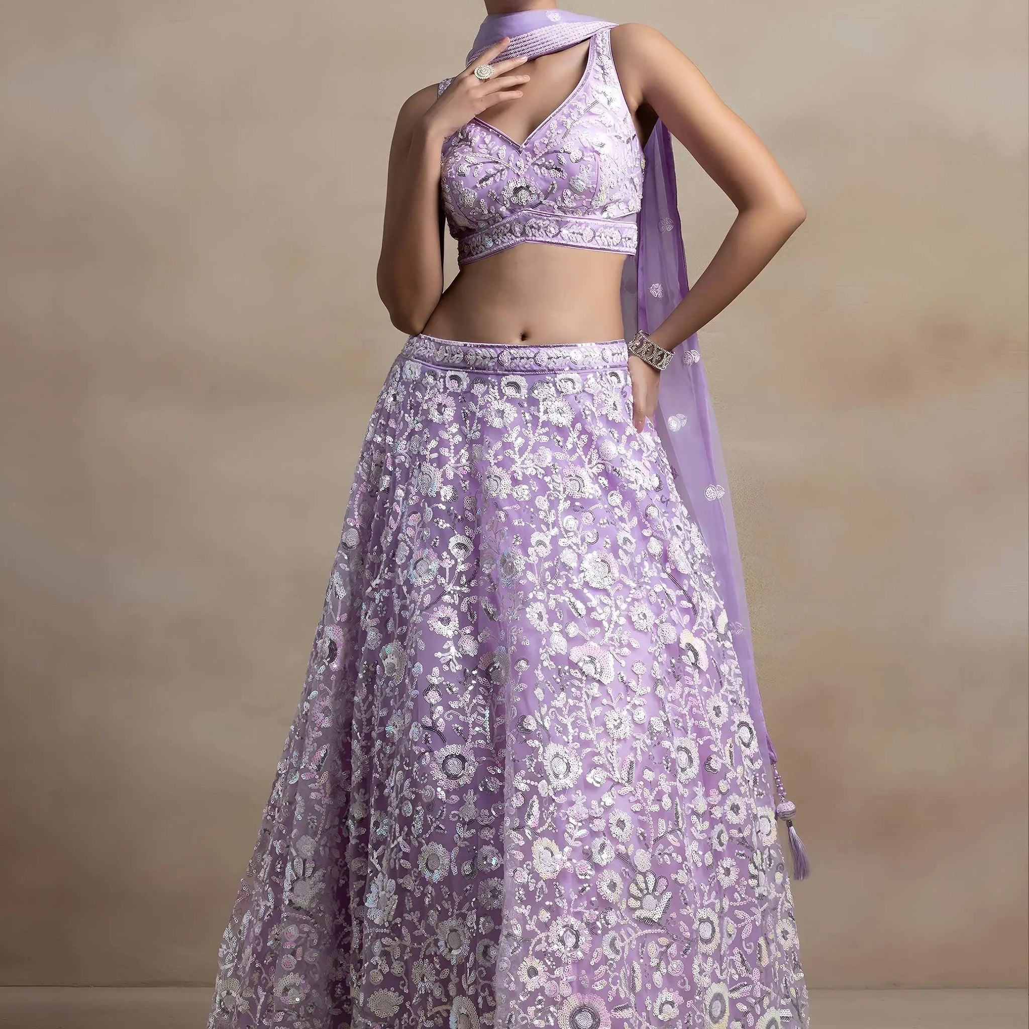 Surprising Lavender Sequins Net Reception Wear Lehenga Choli