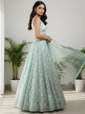 Stellar Green Sequins Net Bridesmaid Lehenga Choli With Dupatta