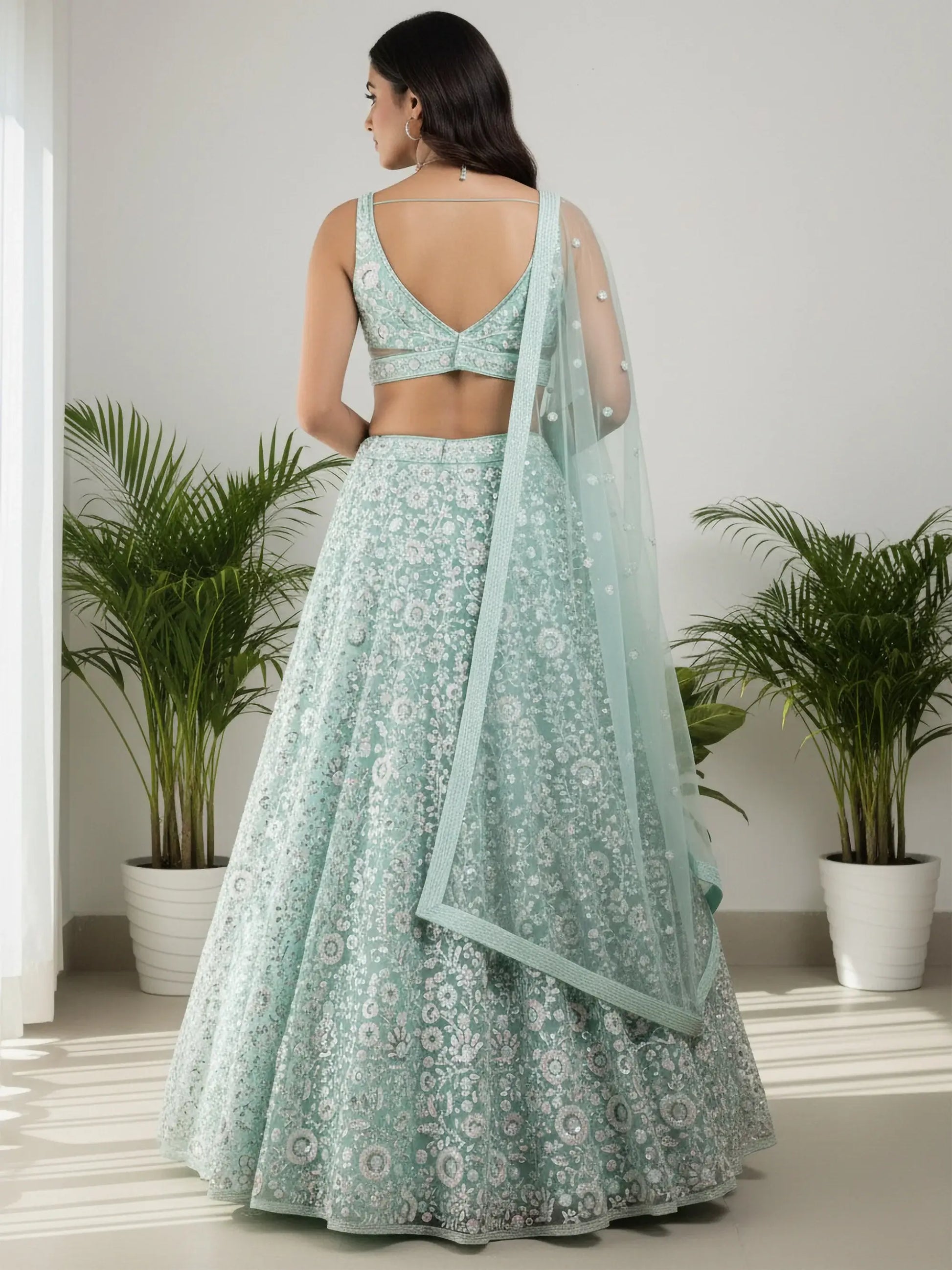 Stellar Green Sequins Net Bridesmaid Lehenga Choli With Dupatta