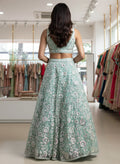 Alluring Mint Green Sequins Net Reception Wear Lehenga With Blouse