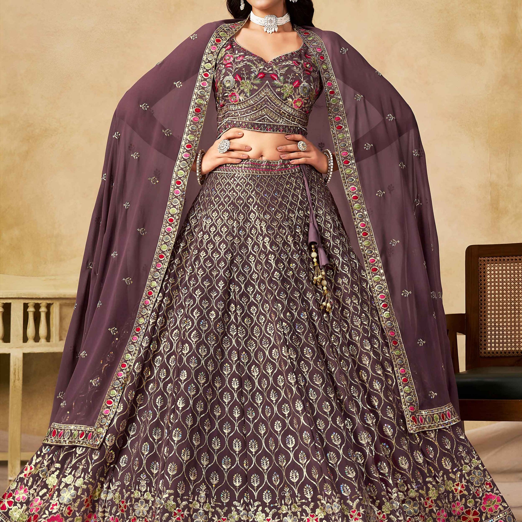 Stupendous Purple Heavy Embroidered Georgette Traditional Lehenga Choli