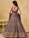Stupendous Purple Heavy Embroidered Georgette Traditional Lehenga Choli