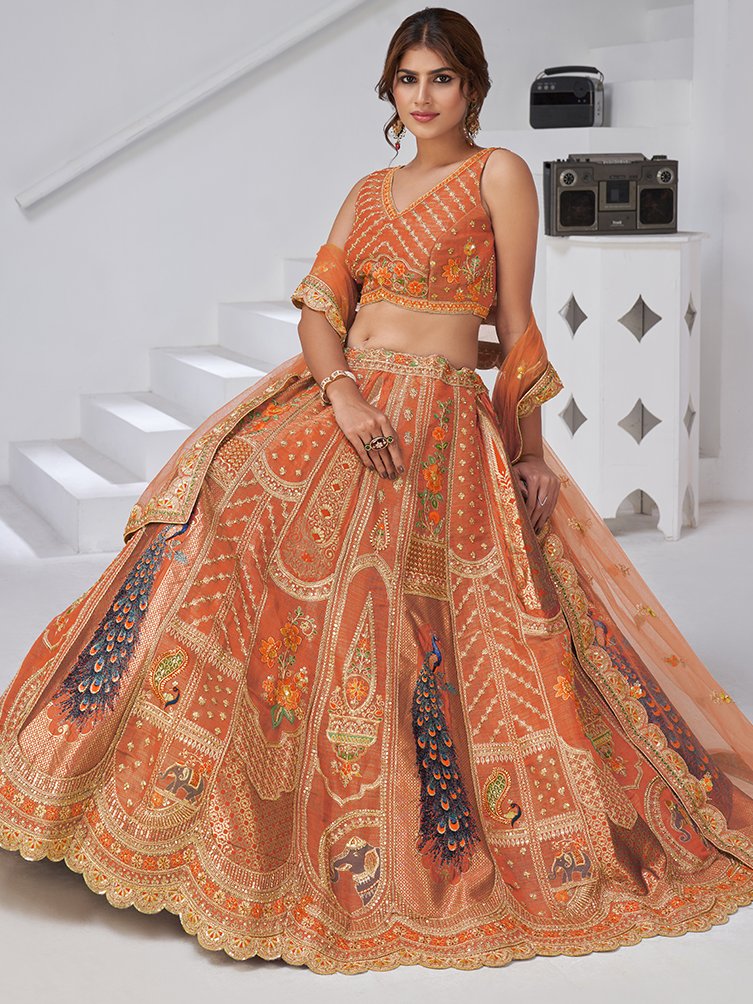 Spectacular Rust Orange Embroidered Banarasi Silk Designer Lehenga Choli With Dupatta