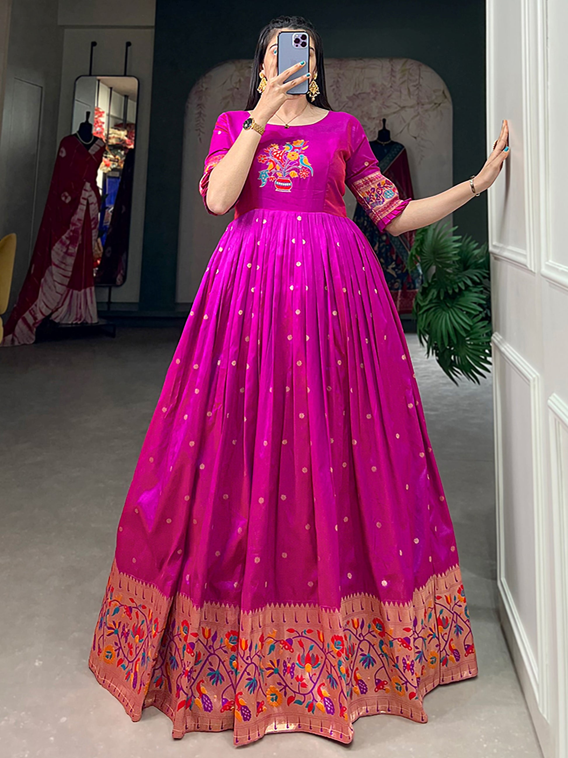 Sparkling Purple Zari Weaving Silk Festival Wear Gown